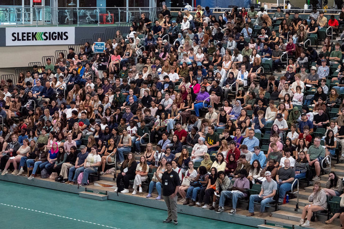 People sitting in an gymnasium