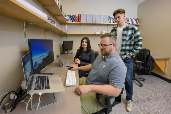Students working on computer together