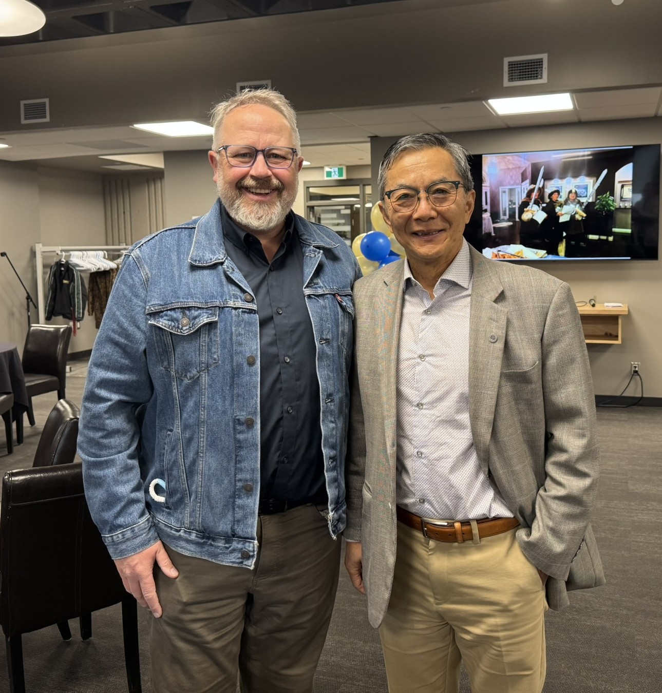 Erik Nickel and Hairuo Qing at Hairuo's retirement party, May 2026