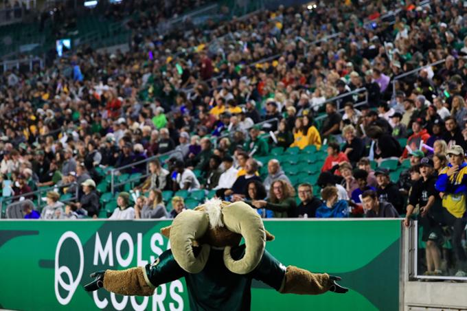 The Rams mascot tries to generate excitement in a crowd.