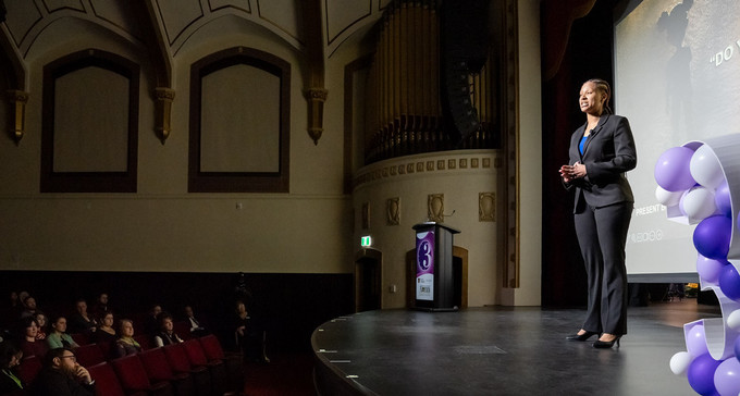 person in the spotlight on a stage