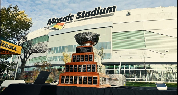 a trophy outside a large stadium