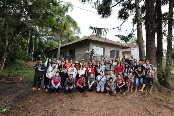 A group of people in a jungle setting