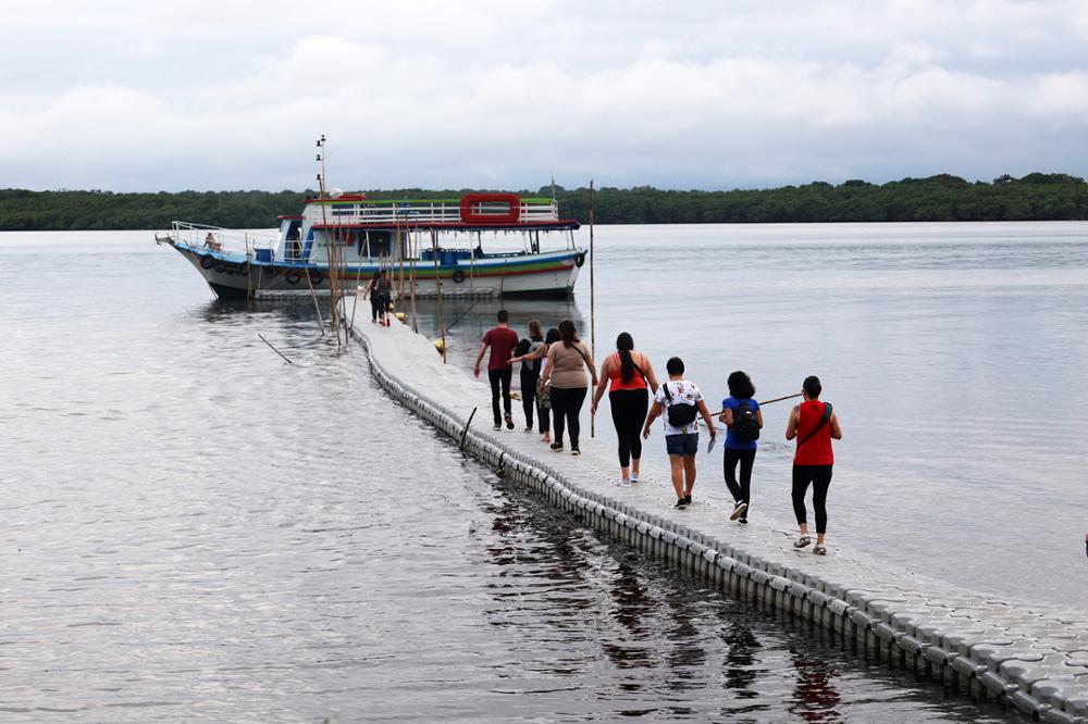 People walking on a dock