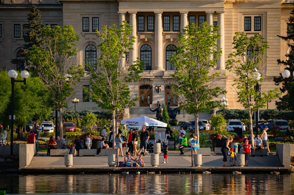 People attending an event near a lake