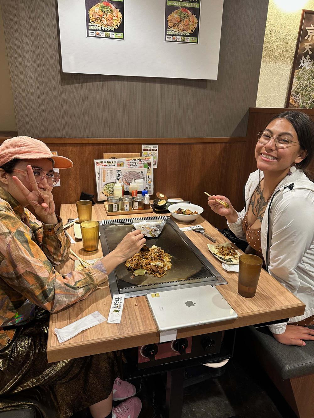 Two people at a restaurant in Japan