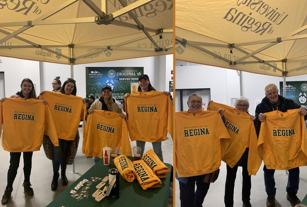 Fans showing off some free sweatshirts