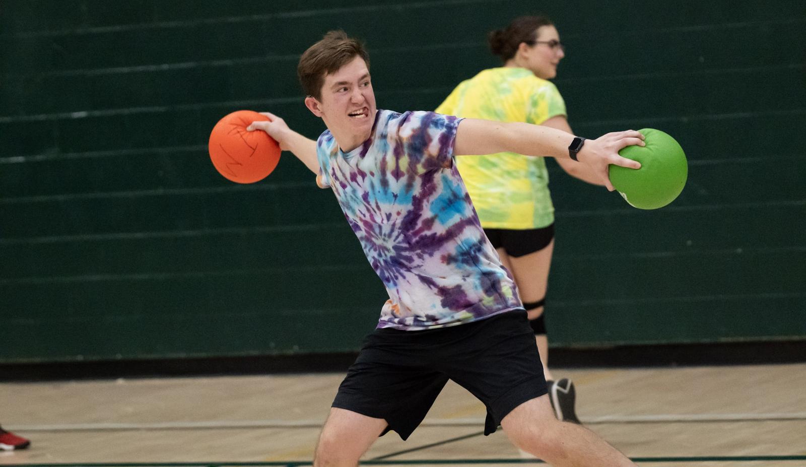 Intense guy throwing dodgeballs
