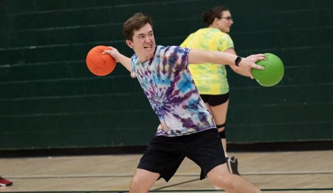 Intense guy throwing dodgeballs