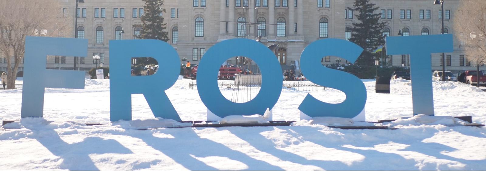 The legislative building in Regina with the FROST logo