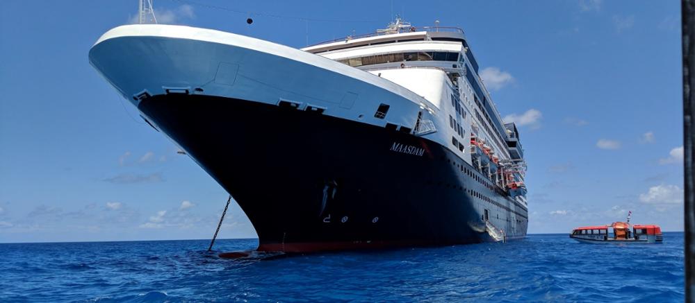 Photo of a cruise ship on the ocean.