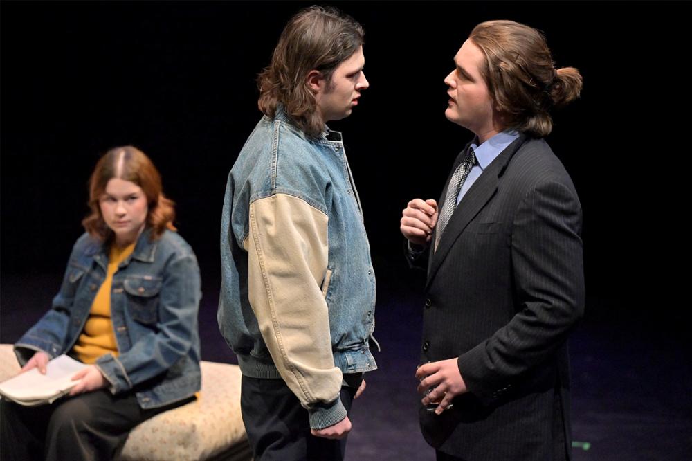 Actors on a stage in a play.