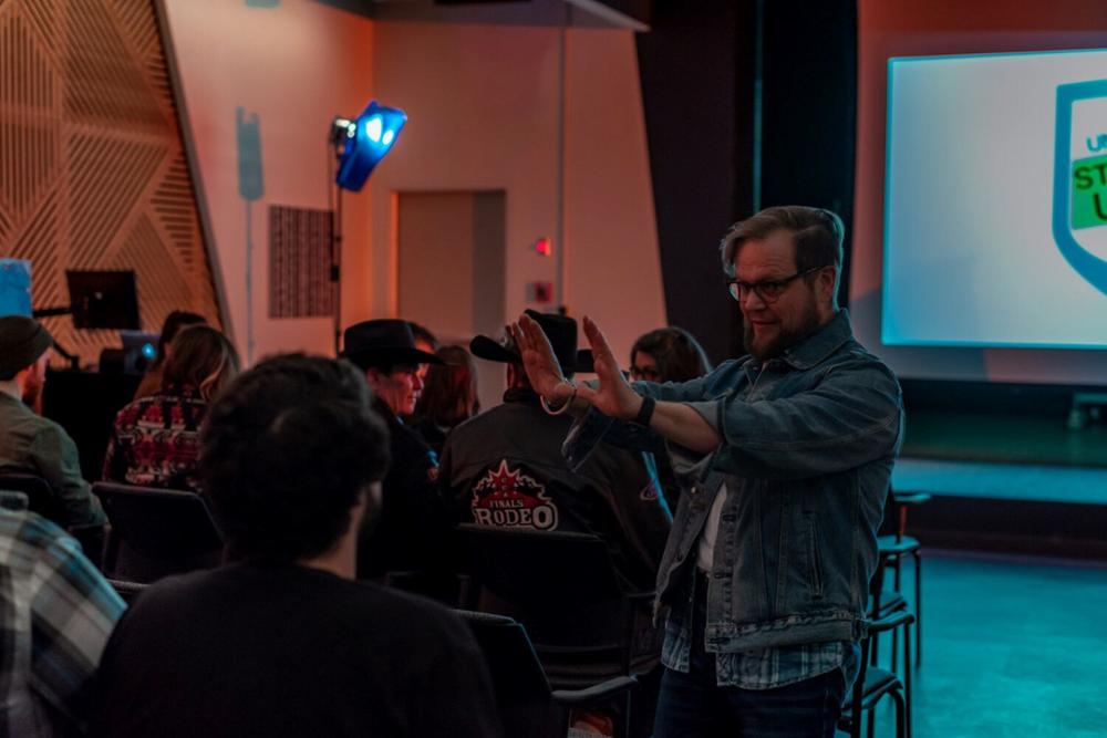 a group of people watching a film