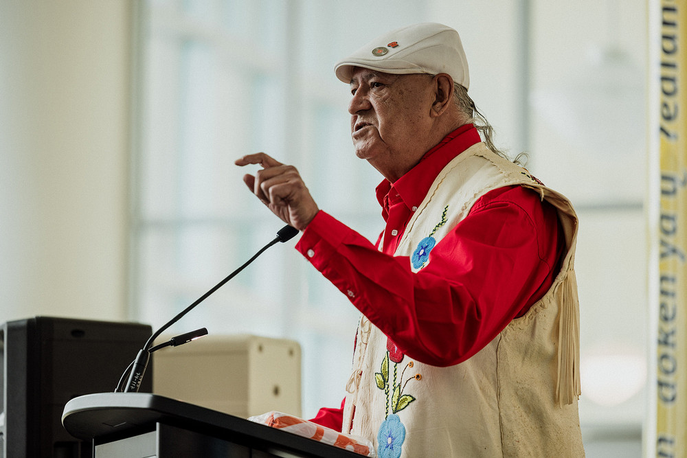An individual standing at a podium.