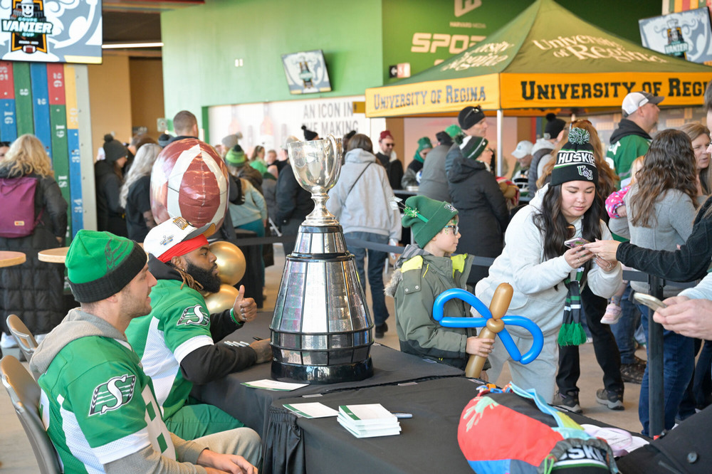 A trophy displayed on a table at the tailgate party