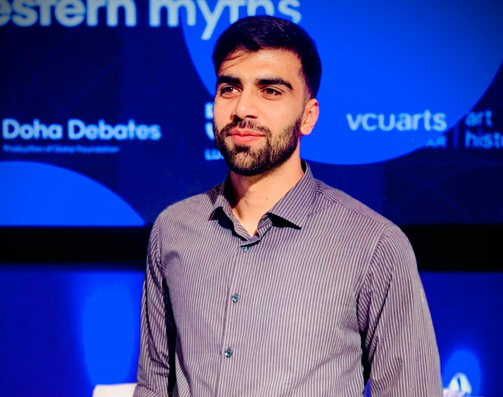 Young man standing indoors