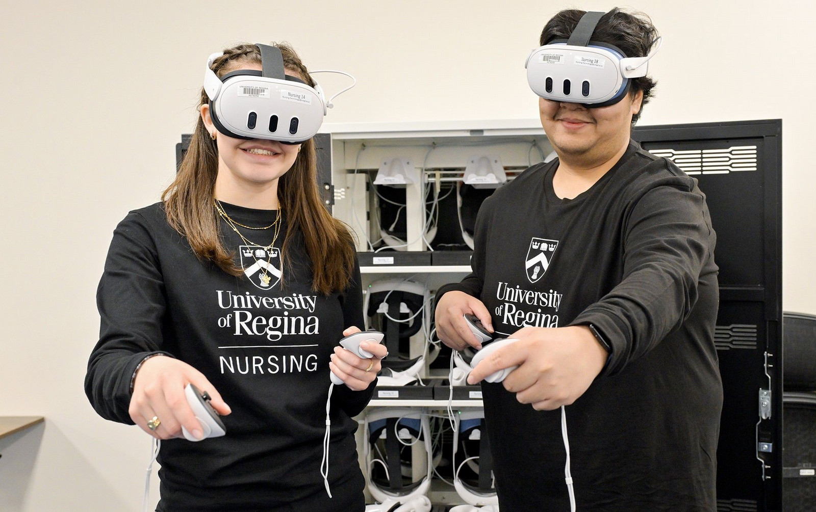 Students with virtual reality headsets on in a lab setting.