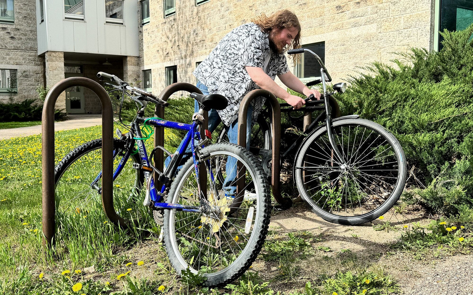 person locking up a bike