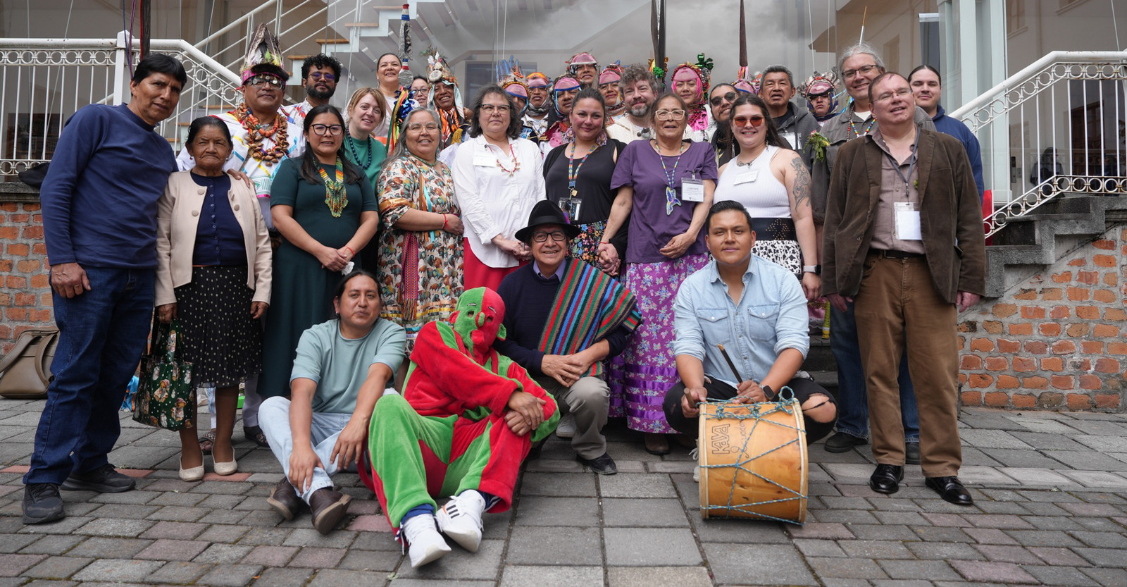 A group of people gathered and smiling