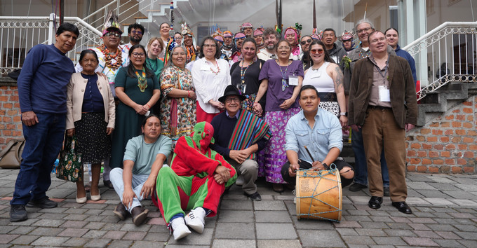 A group of people gathered and smiling