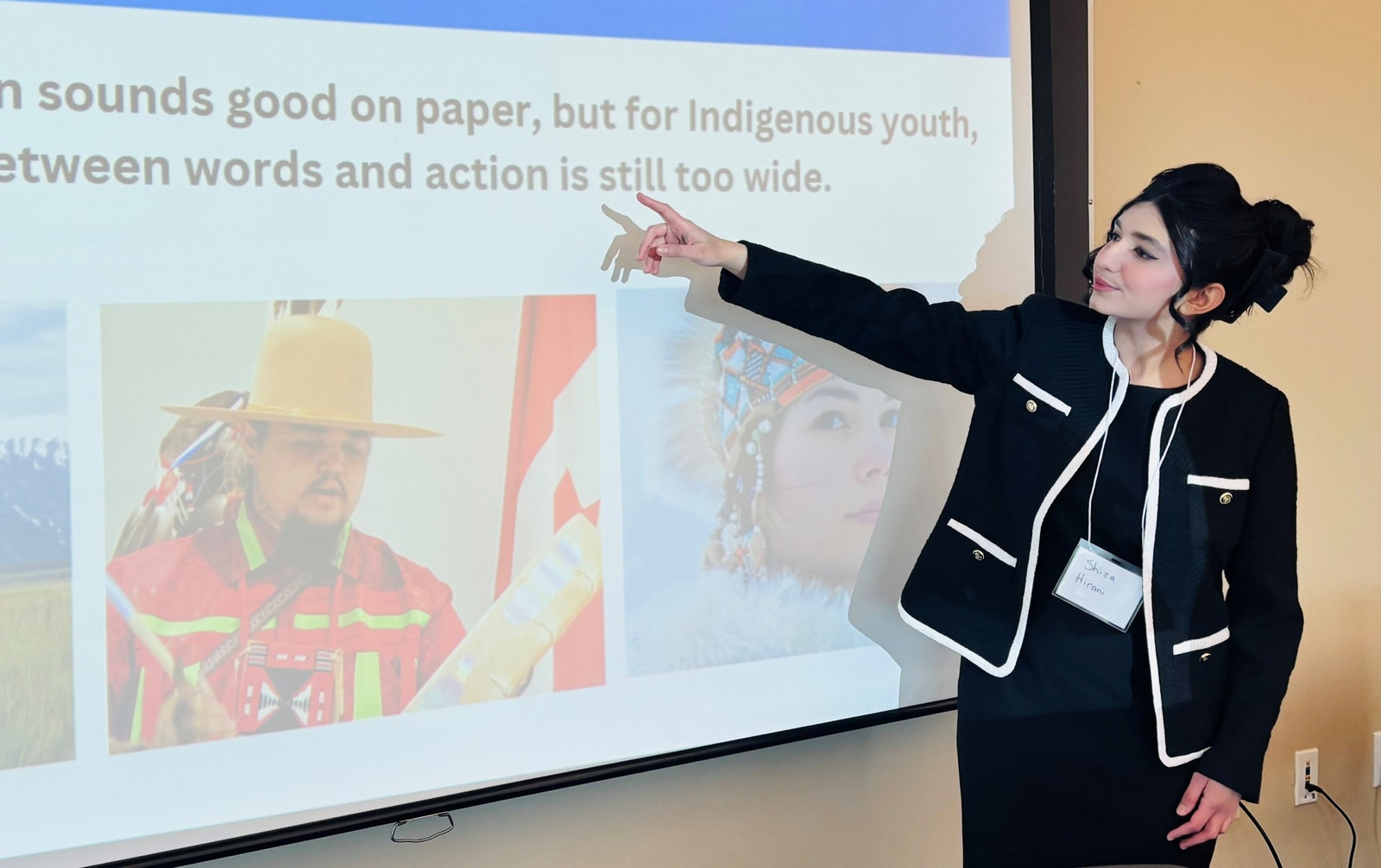 A person pointing at a presentation
