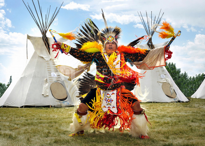 Indigenous dancer in full regalia