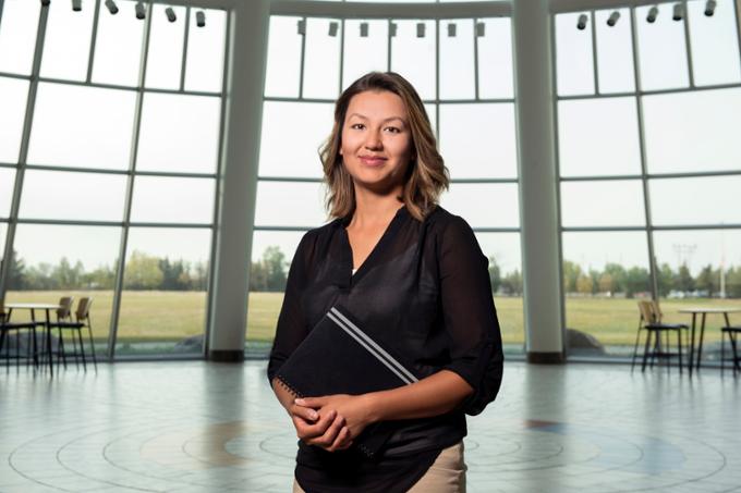 Woman standing in FNUniv building