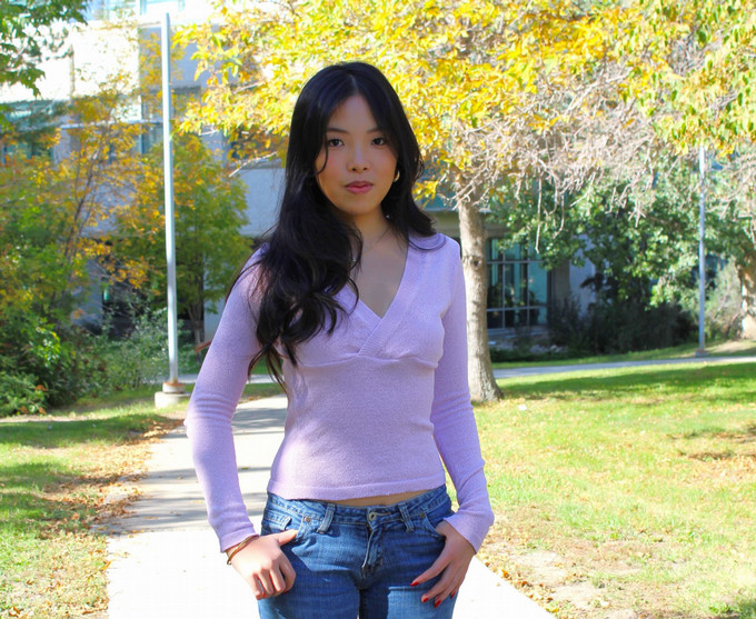 Girl standing outside.