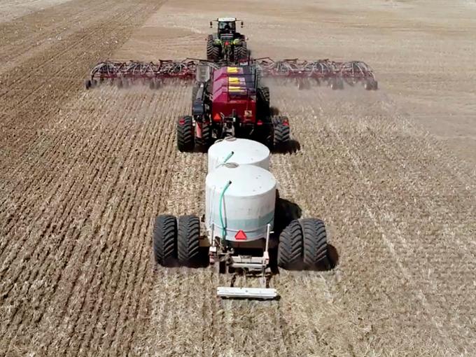 Large agricultural equipment on a farm.