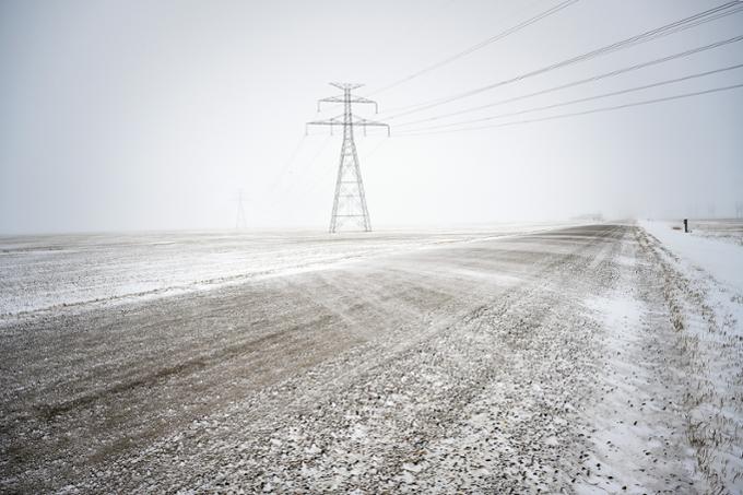 a power line on a wintery road